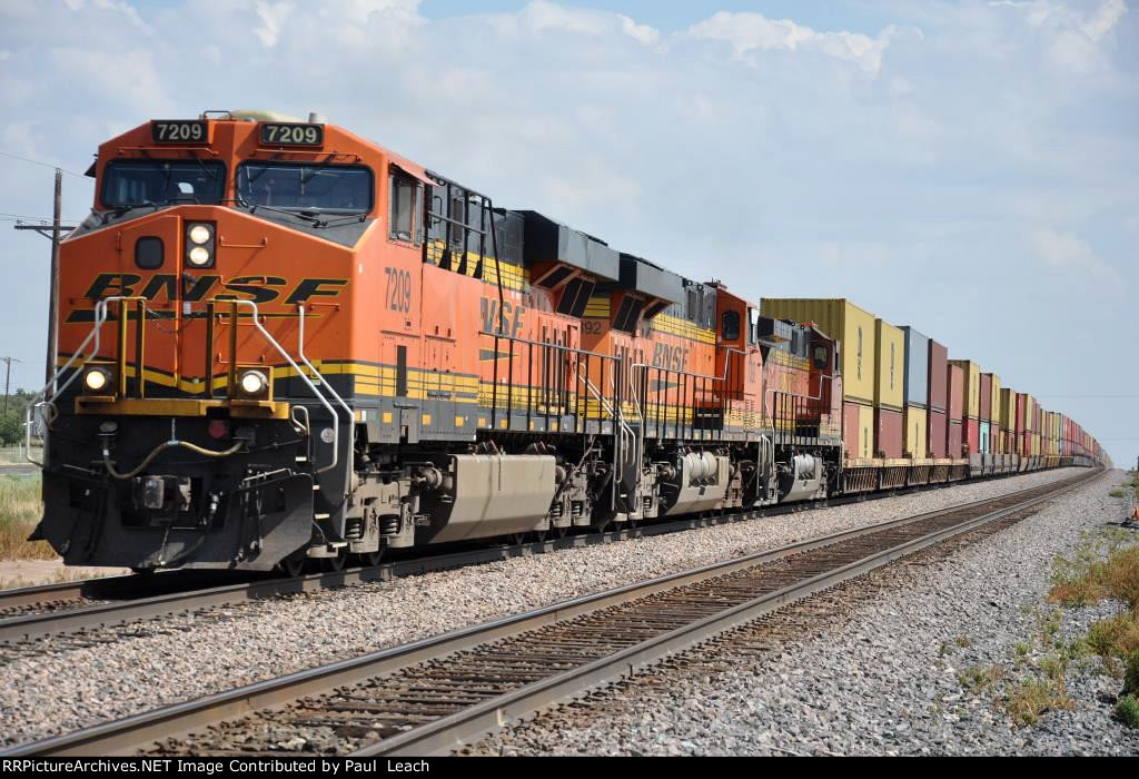 Westbound stack train crests the grade